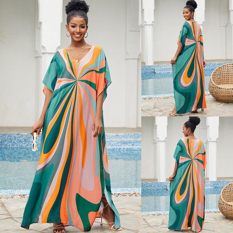 Green and orange swirl maxi cover-up dress with V-neck and loose, flowing fit