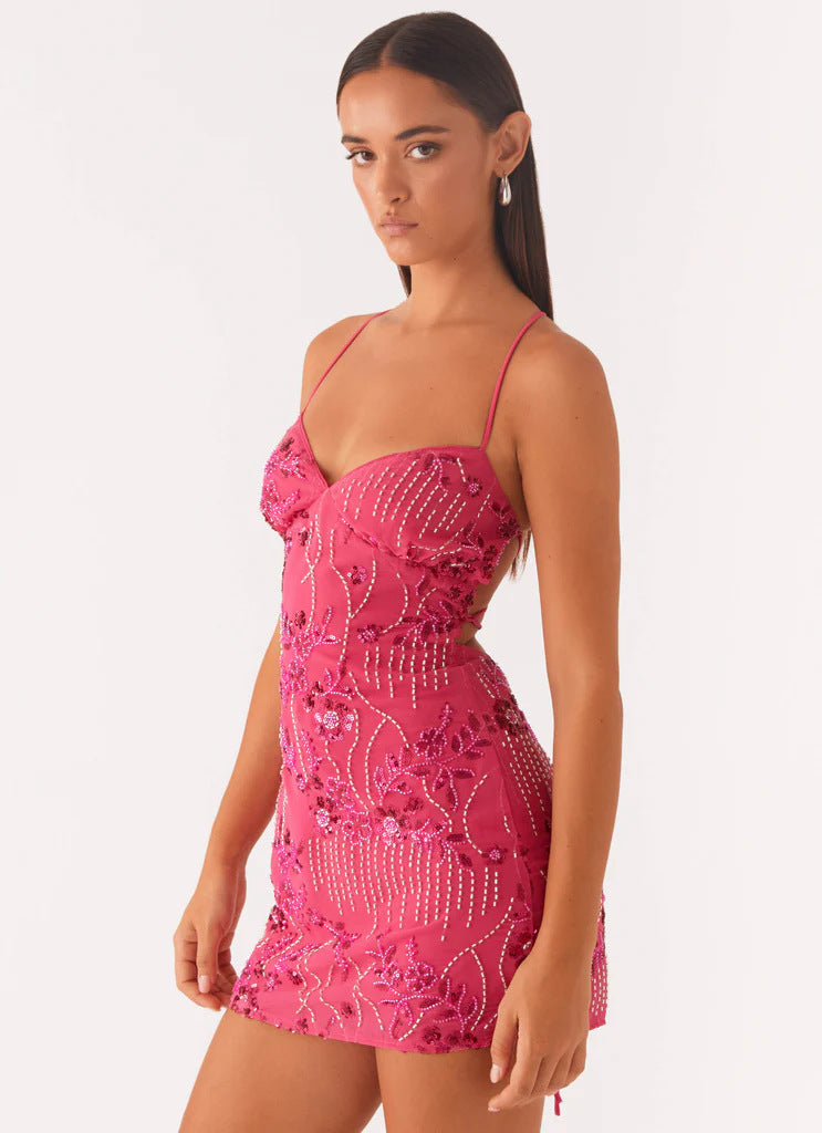 Coral pink sequined spaghetti-strap mini dress with fitted corset bodice