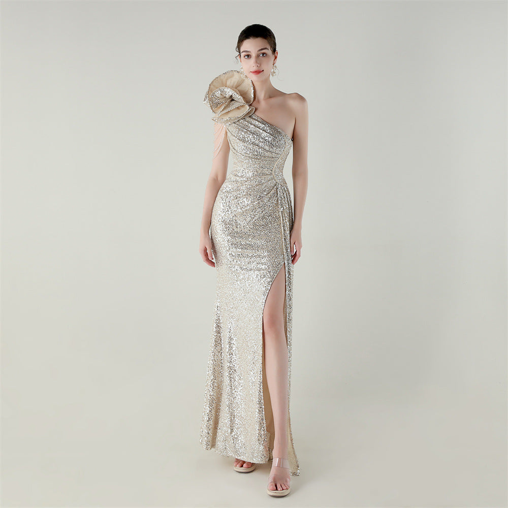 Light gold one-shoulder beaded evening dress with diagonal neckline and side slit fishtail hem