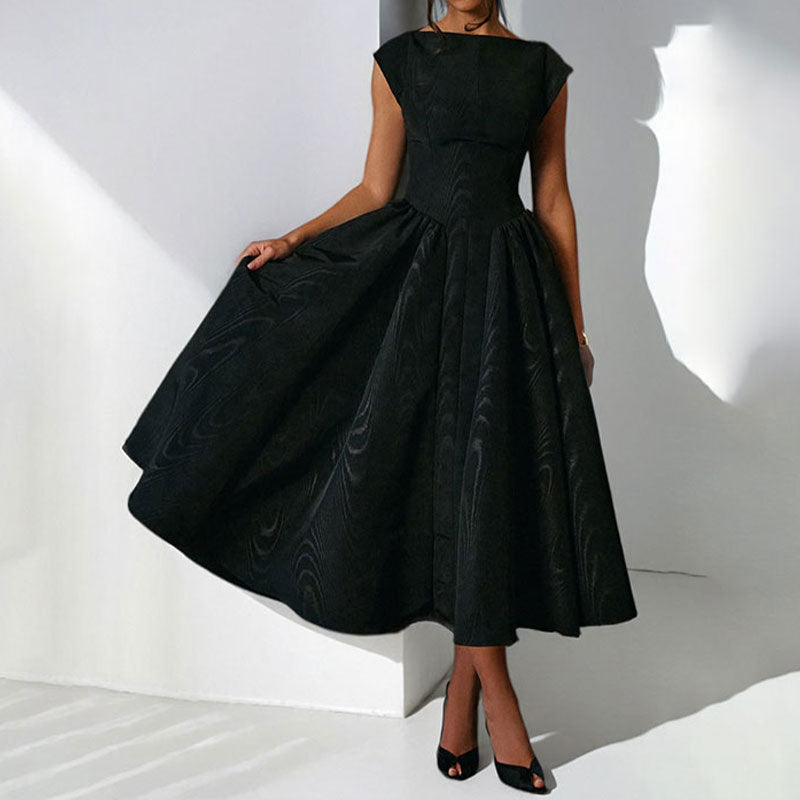 Black sleeveless swing dress with gathered waist and wide pleated midi skirt