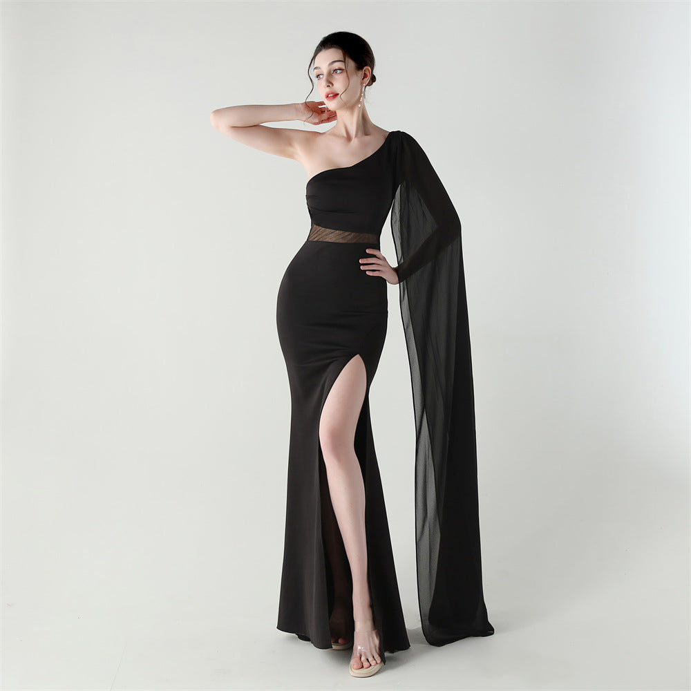Single-shoulder satin slim cocktail dress with thigh slit and sheer mesh drape, black.