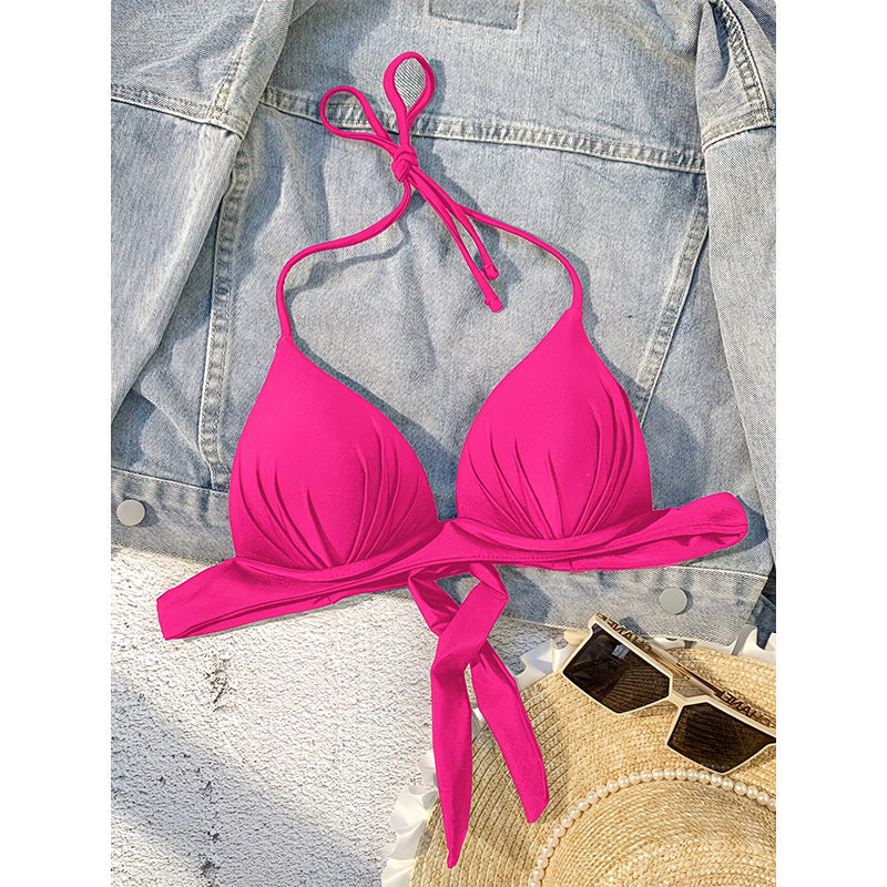 Bright pink halter triangle bikini top with lace-up back and tied push-up cups