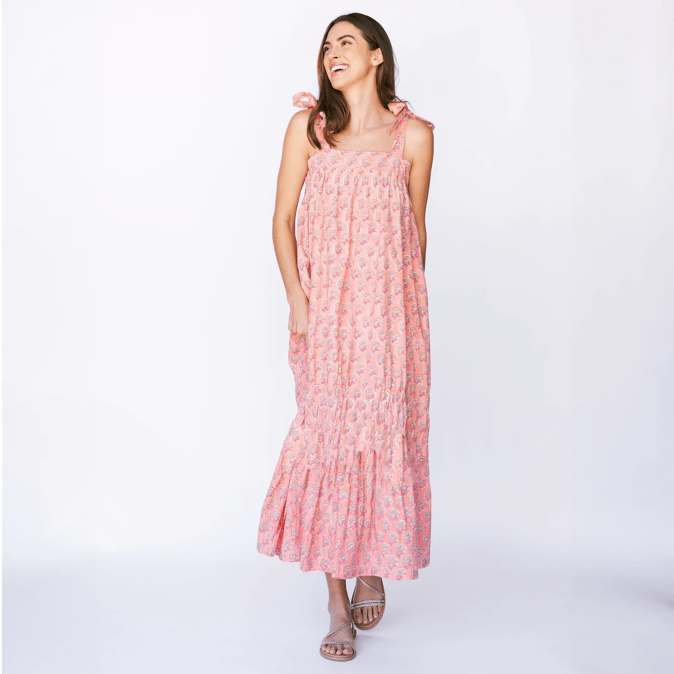 Pink printed sleeveless maxi dress with smocked bodice and tiered skirt