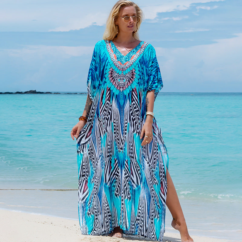 Printed beach cover-up robe in blue and white with diamond patterns, flowy maxi sleeves