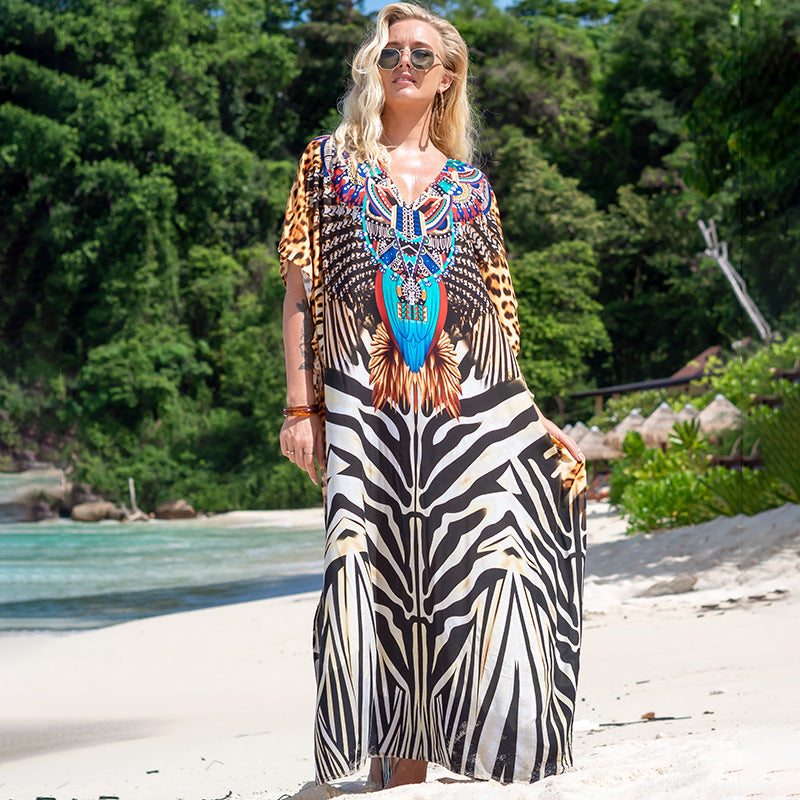 Printed beach cover-up robe with black-and-white zebra stripes and colorful medallion print