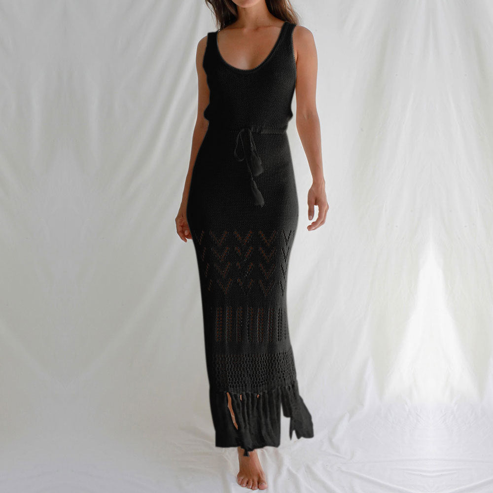 Black sleeveless crochet maxi dress with scoop neck, drawstring waist, tassel hem
