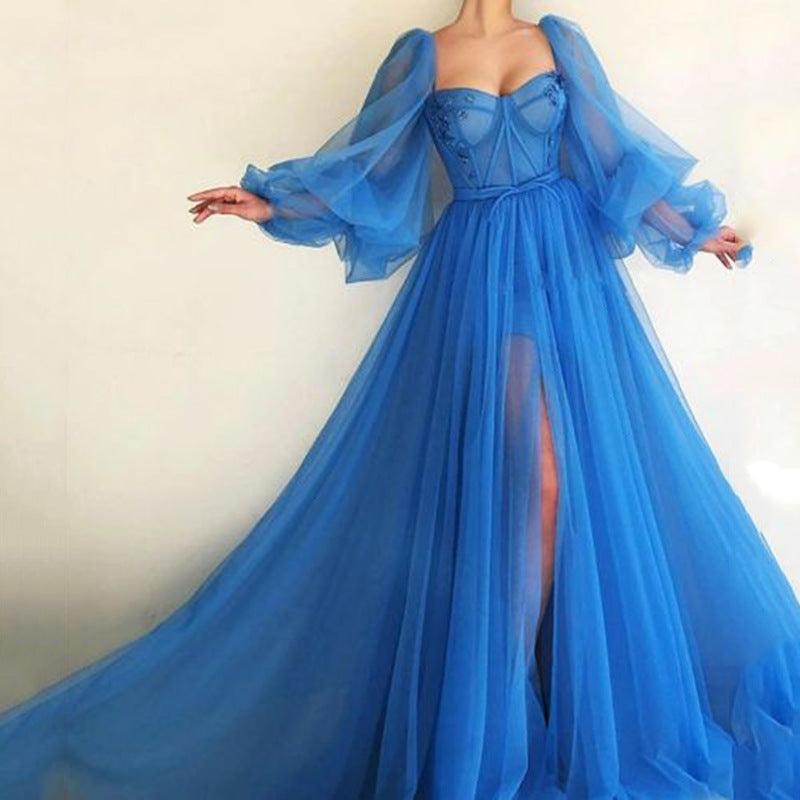 Light blue mesh corset-style maxi dress with sheer puff sleeves and front slit