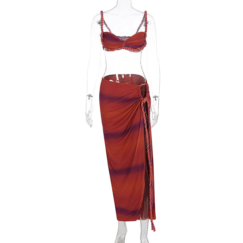 Burgundy halter ruched bikini top and draped high-slit wrap skirt swimsuit set