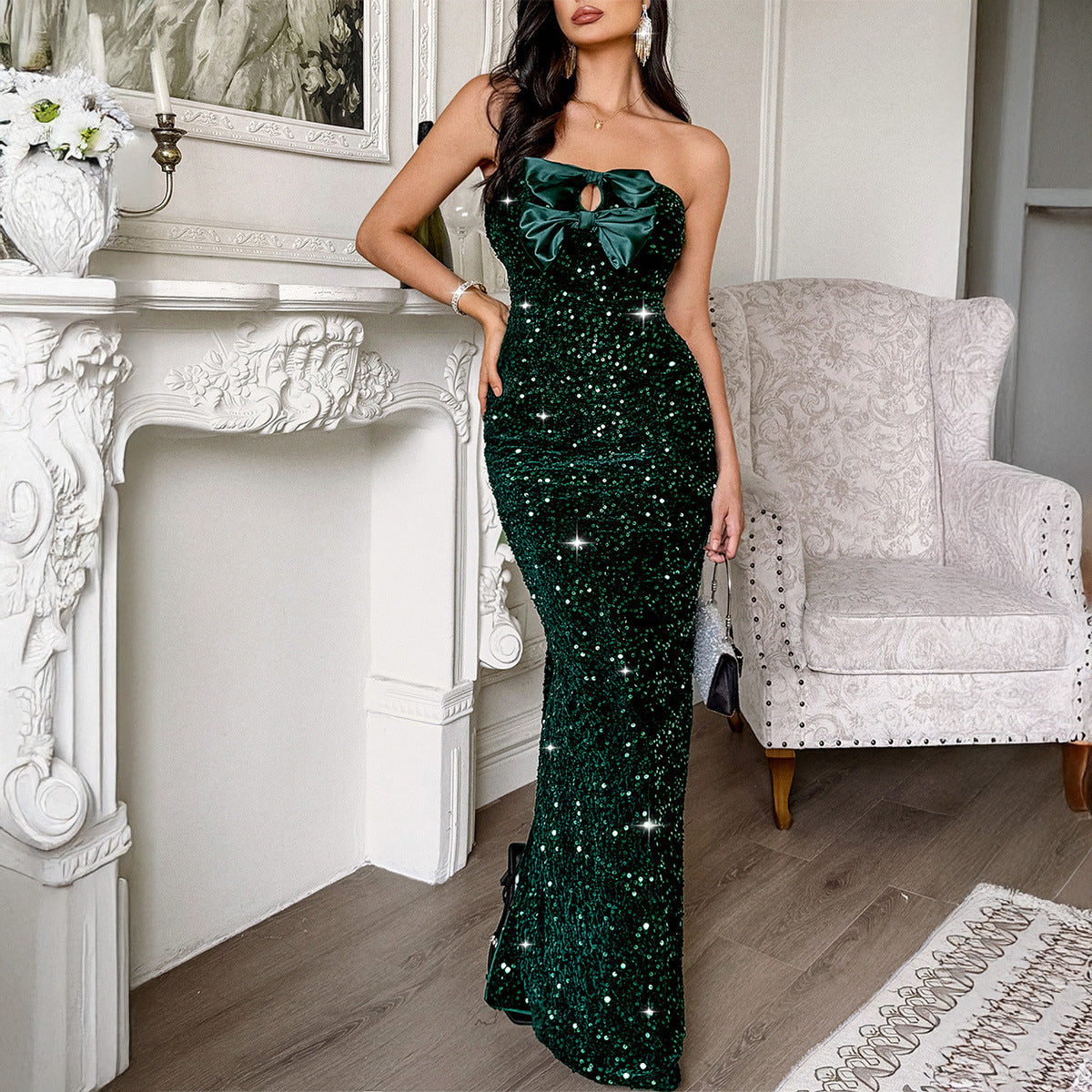 Women's dark green sequin strapless maxi dress with center bow and long column hem