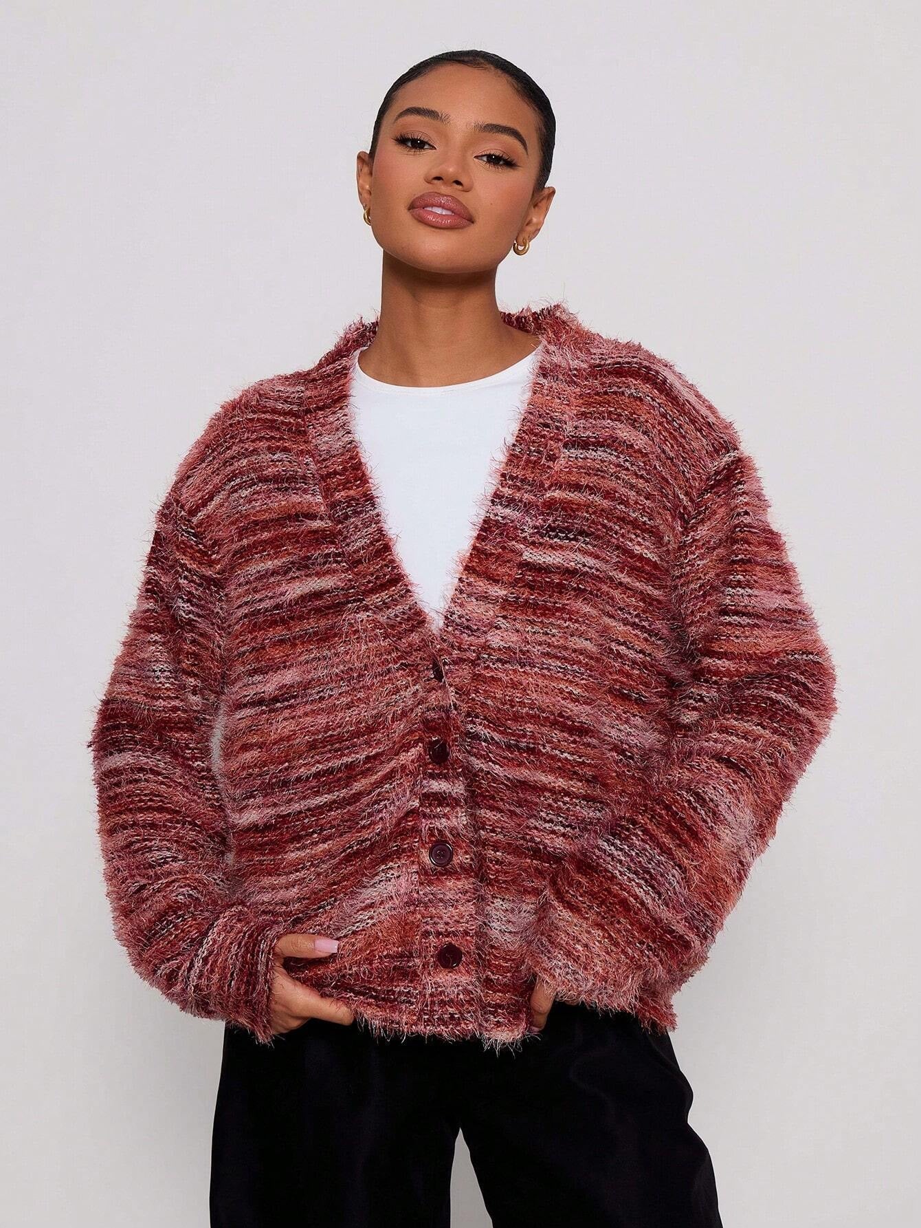 Red-burgundy marled plush cardigan with deep V plunge, long sleeves, button front.