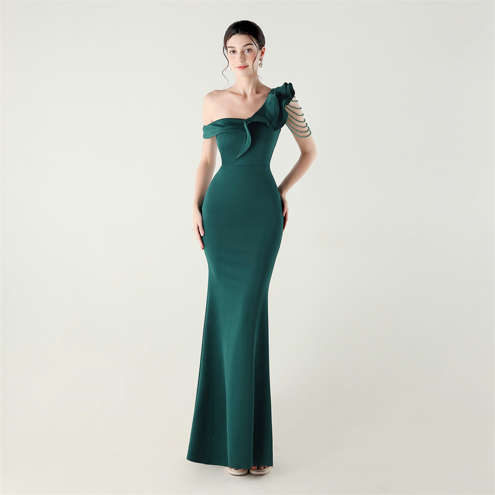 Teal one-shoulder satin evening dress with ruffled shoulder and slim mermaid hem