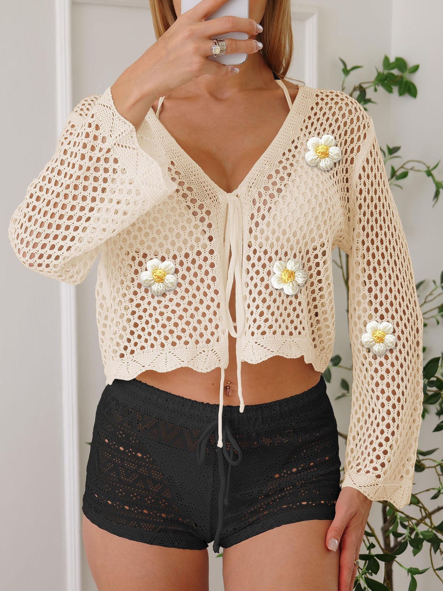 Light cream hollow-knit cardigan with flower patches, front tie, long sleeves