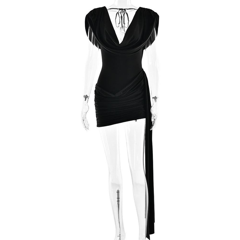 Black backless sleeveless mini dress on mannequin with cowl V-neck and ruched waist