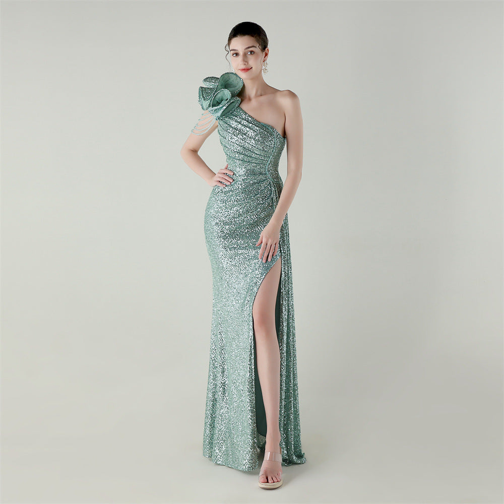 Mint green one-shoulder beaded evening dress with diagonal neckline and side slit fishtail hem