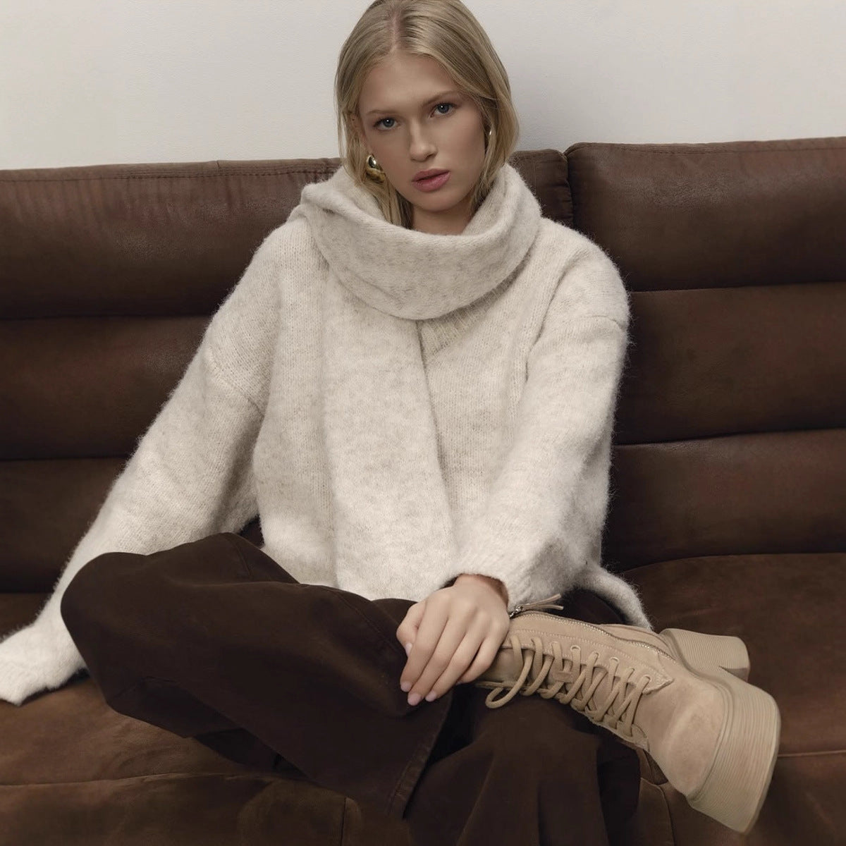 Cream fuzzy wool sweater with wide cowl collar and loose sleeves, relaxed fit
