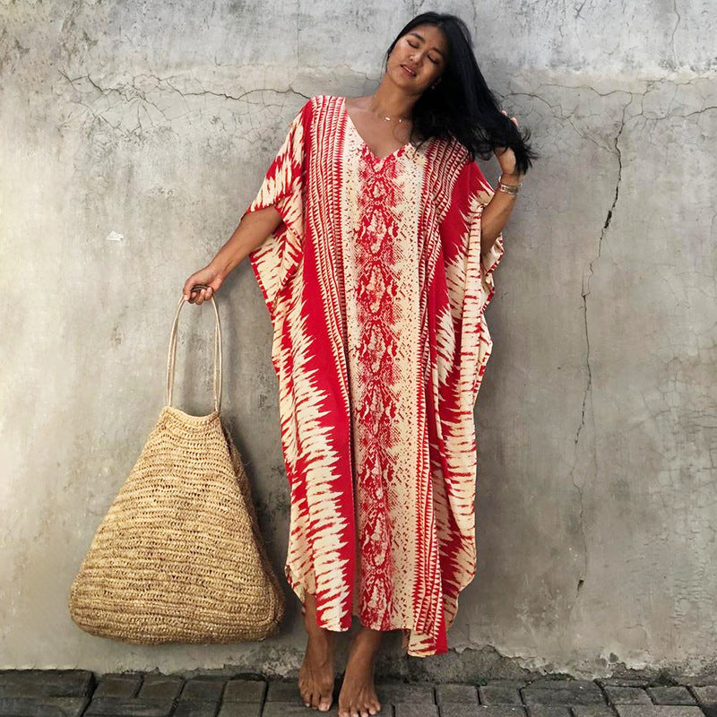 Women’s rayon robe dress in red and cream snake pattern, V-neck, tie waist, side slit