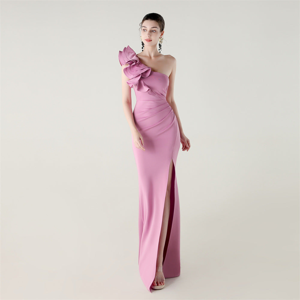One-shoulder mauve satin evening dress with ruffled shoulder and high slit