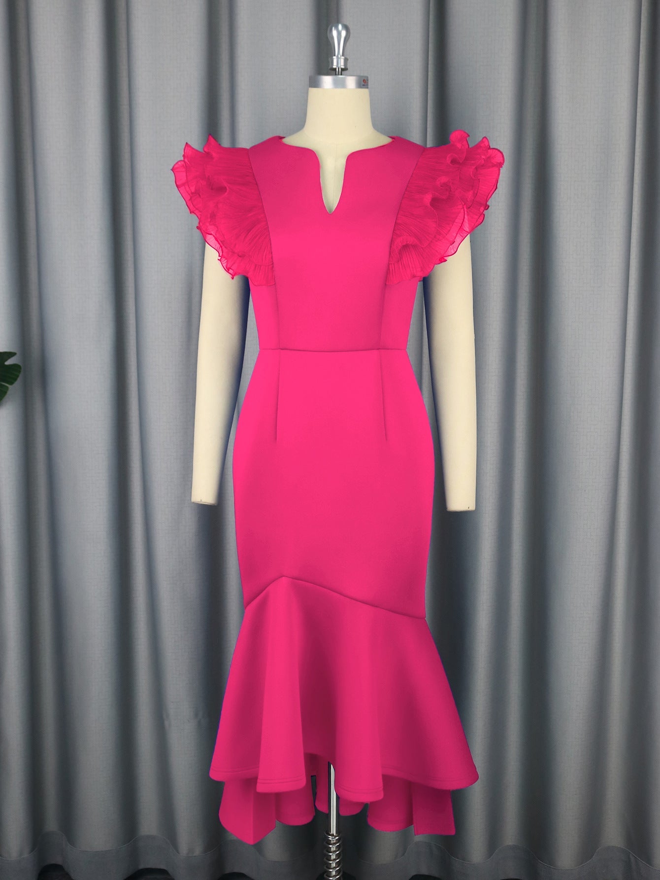 Coral red fitted sheath cocktail dress with layered ruffle sleeves and mermaid hem