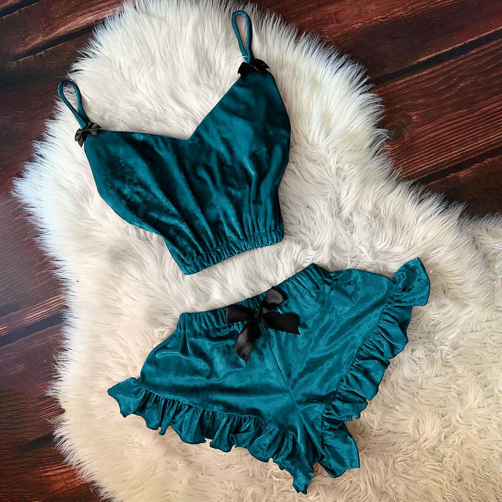 Teal satin cami with spaghetti straps and black bow, matching ruffle shorts set