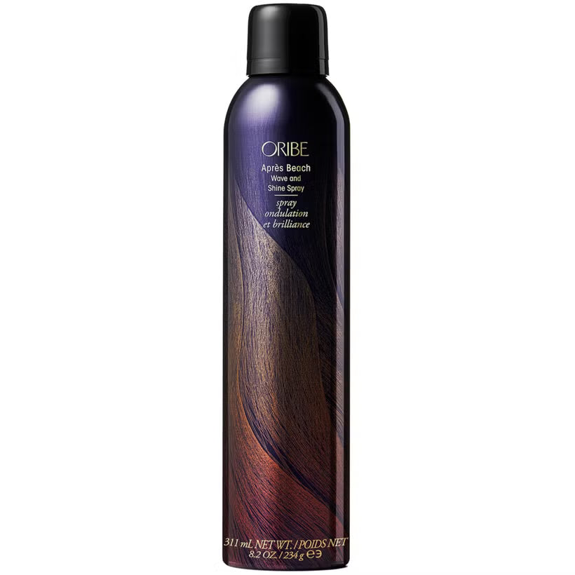 Oribe hair wave and shine spray bottle, dark purple and black.