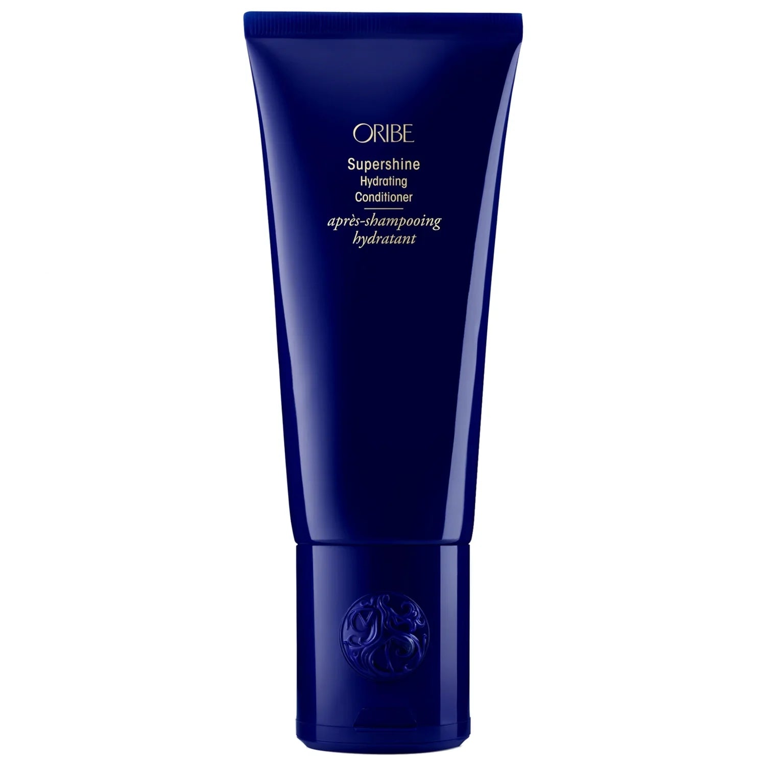 Oribe Supershine hydrating conditioner tube, dark blue plastic squeeze bottle