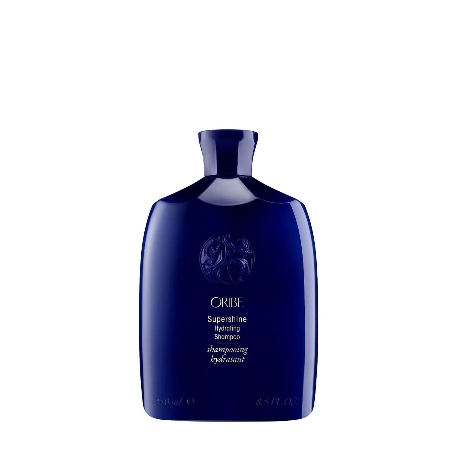 Oribe Supershine hydrating shampoo bottle, dark blue with raised cap