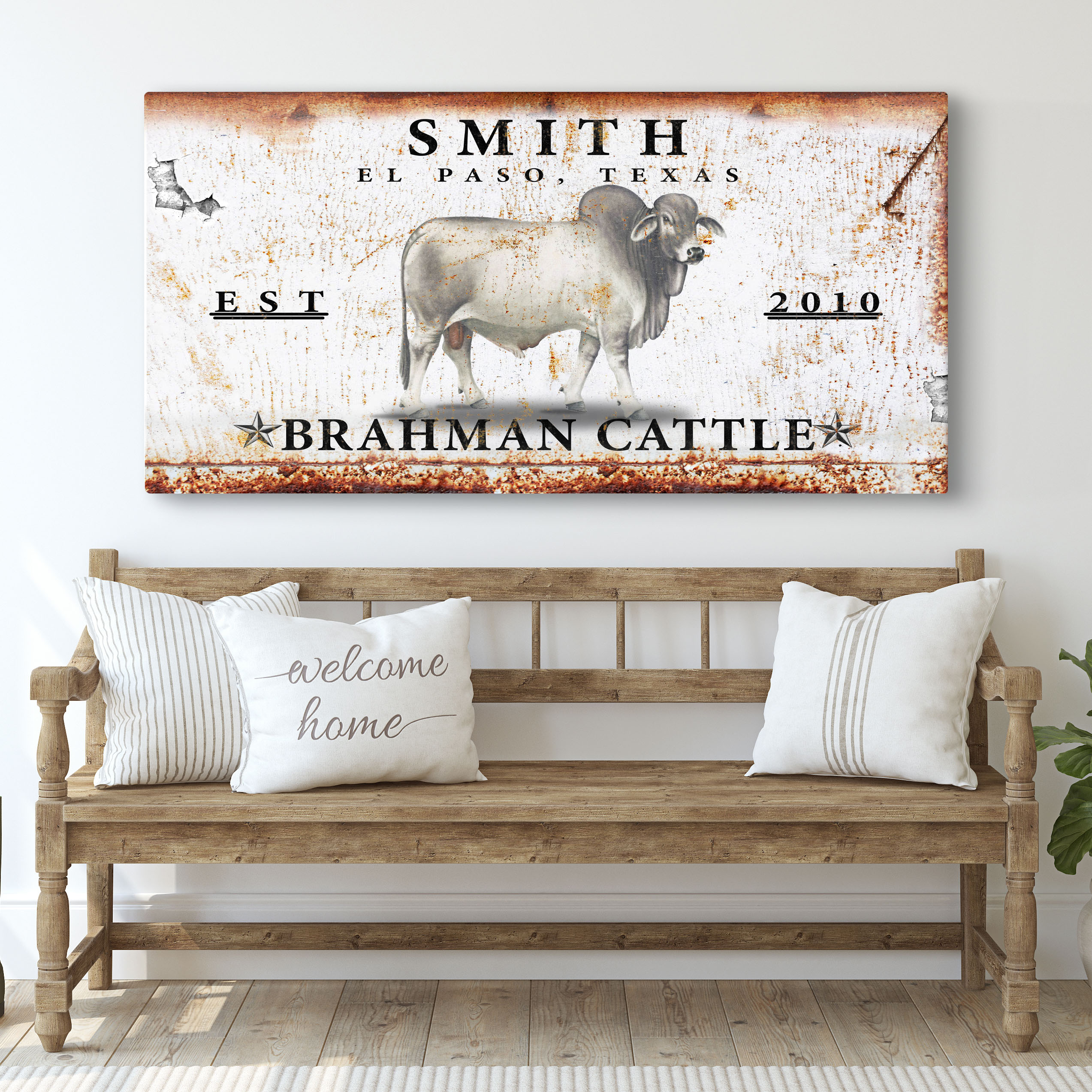 Rustic landscape canvas wall sign with standing bull and calf illustration and 2010 date