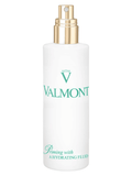 Valmont hydrating fluid bottle with gold pump and white label