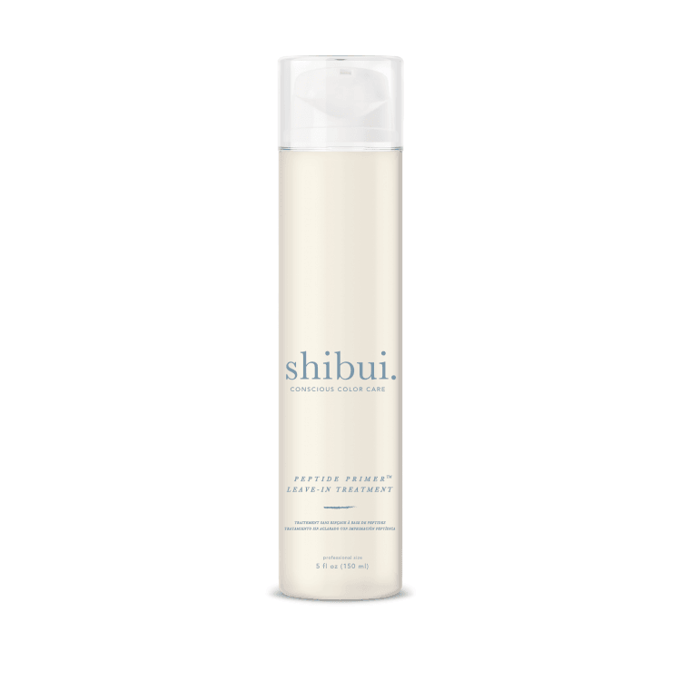 ShiBui peptide primer leave-in treatment bottle, tall clear bottle with beige tint
