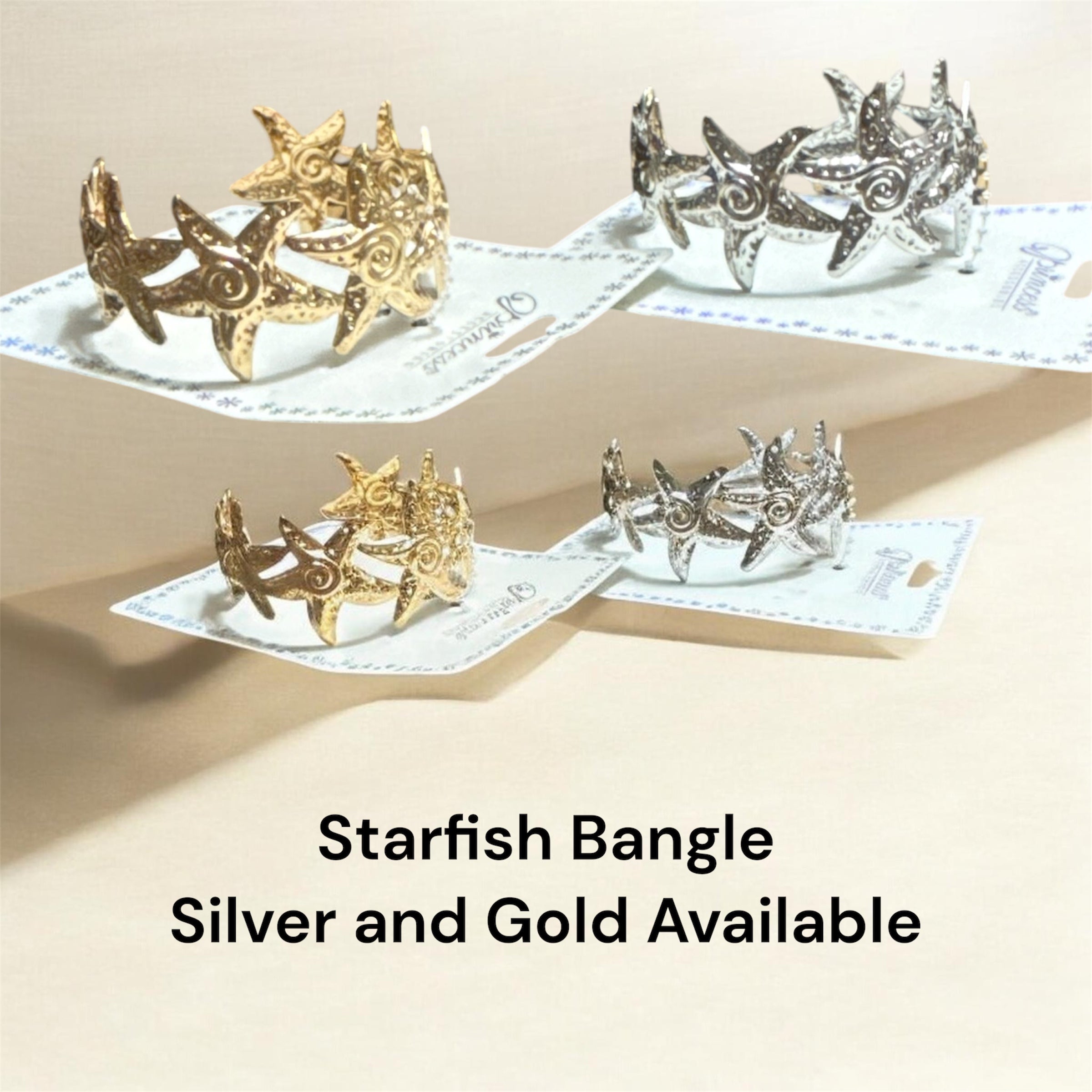Starfish bangle with textured sea star details, gold and silver finish