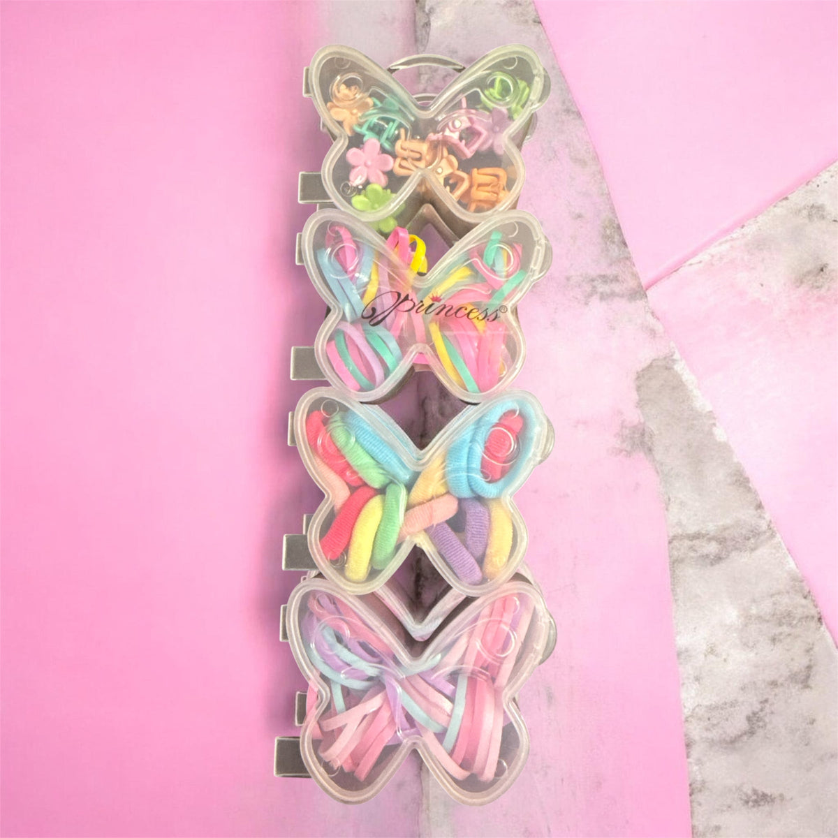 Butterfly hair accessory storage with clear clips holding colorful hair ties