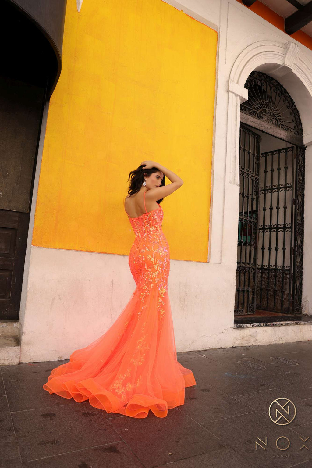 Coral sequin applique trumpet gown, open back and flowing flared skirt