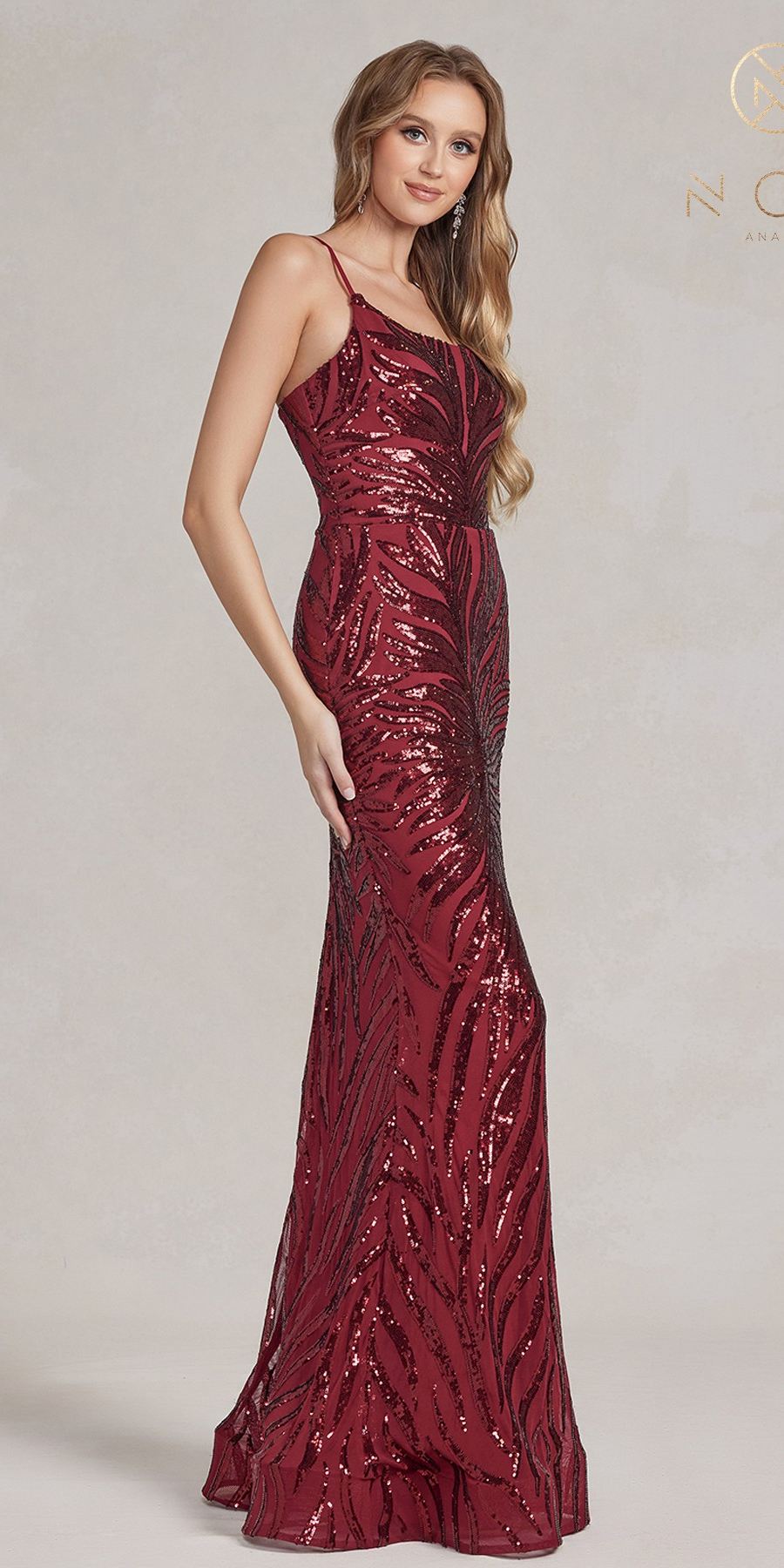 Burgundy fitted sequin evening gown with spaghetti straps and mermaid silhouette