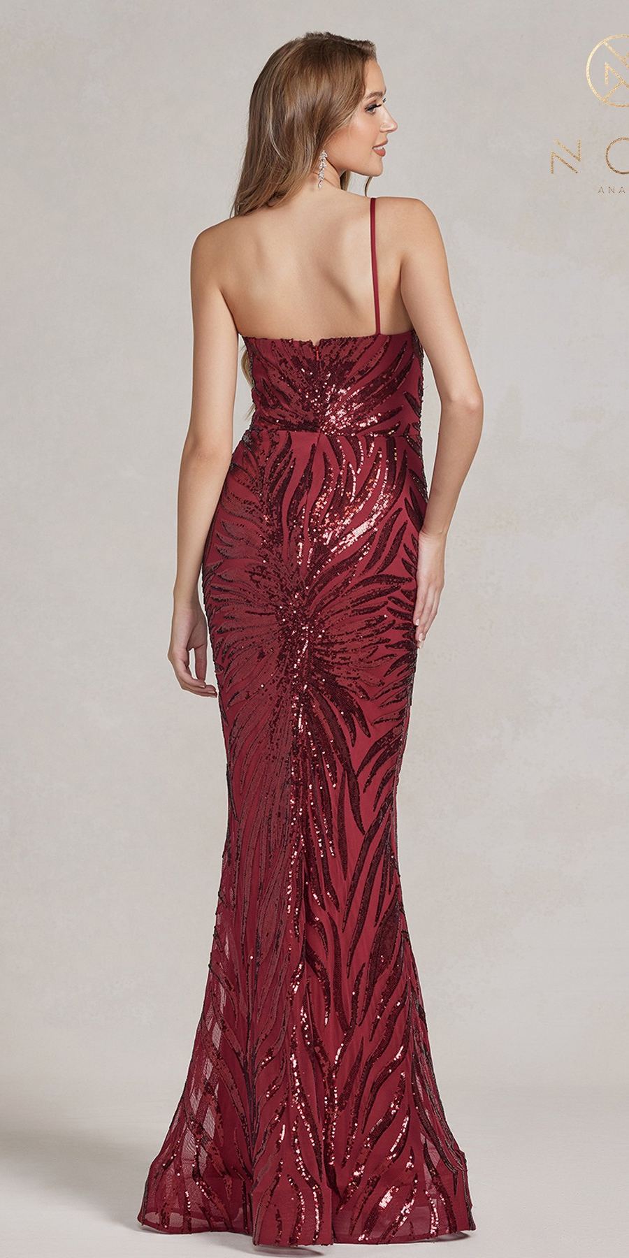 Burgundy fitted sequin evening gown with thin back straps and ruched bodice