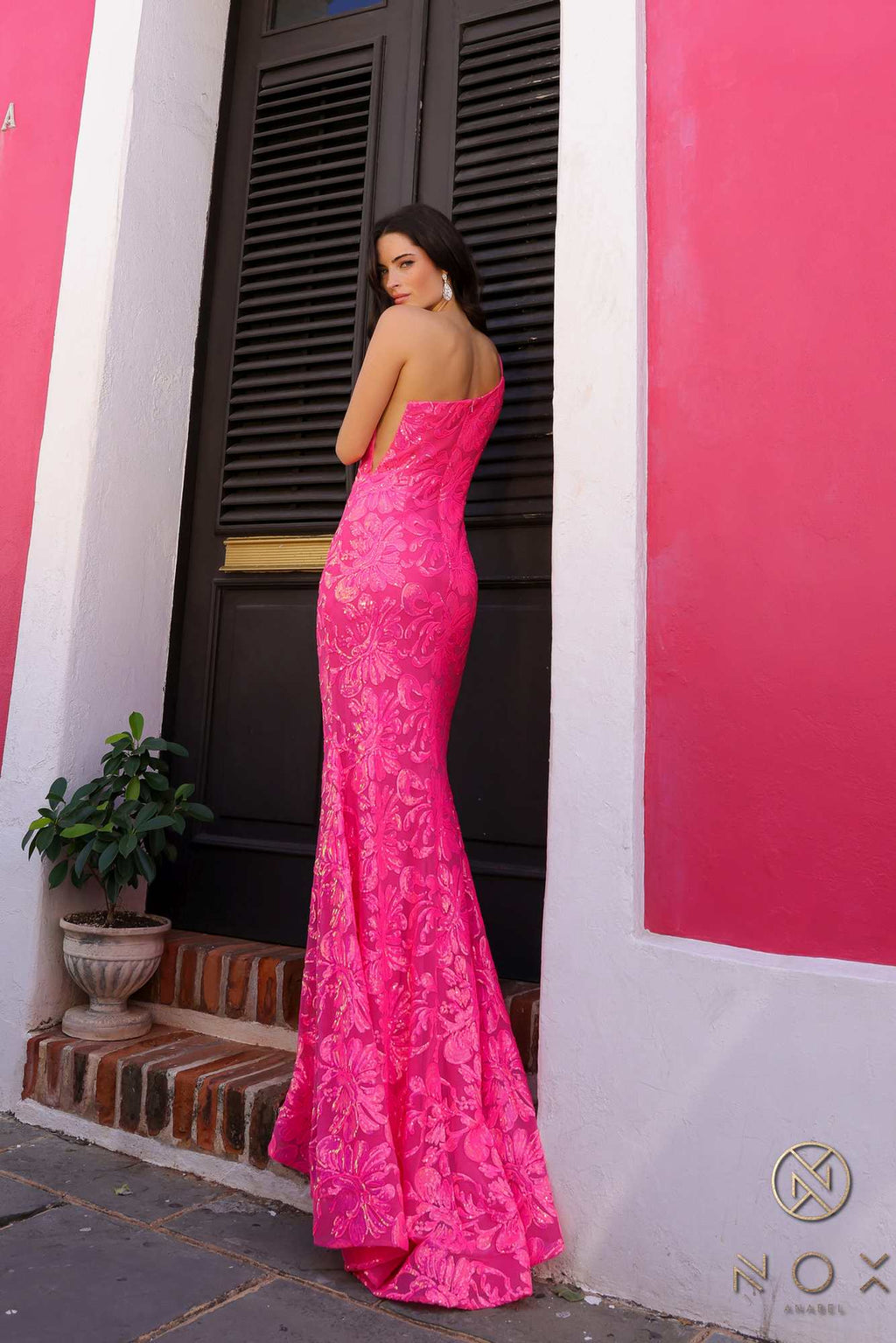 Fuchsia one-shoulder sequin floral mermaid gown with open back and flared hem