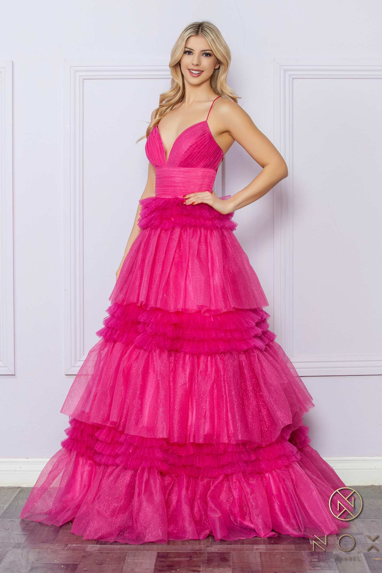 Fuchsia glitter tiered A-line gown with V-neck bodice and cascading ruffled tiers