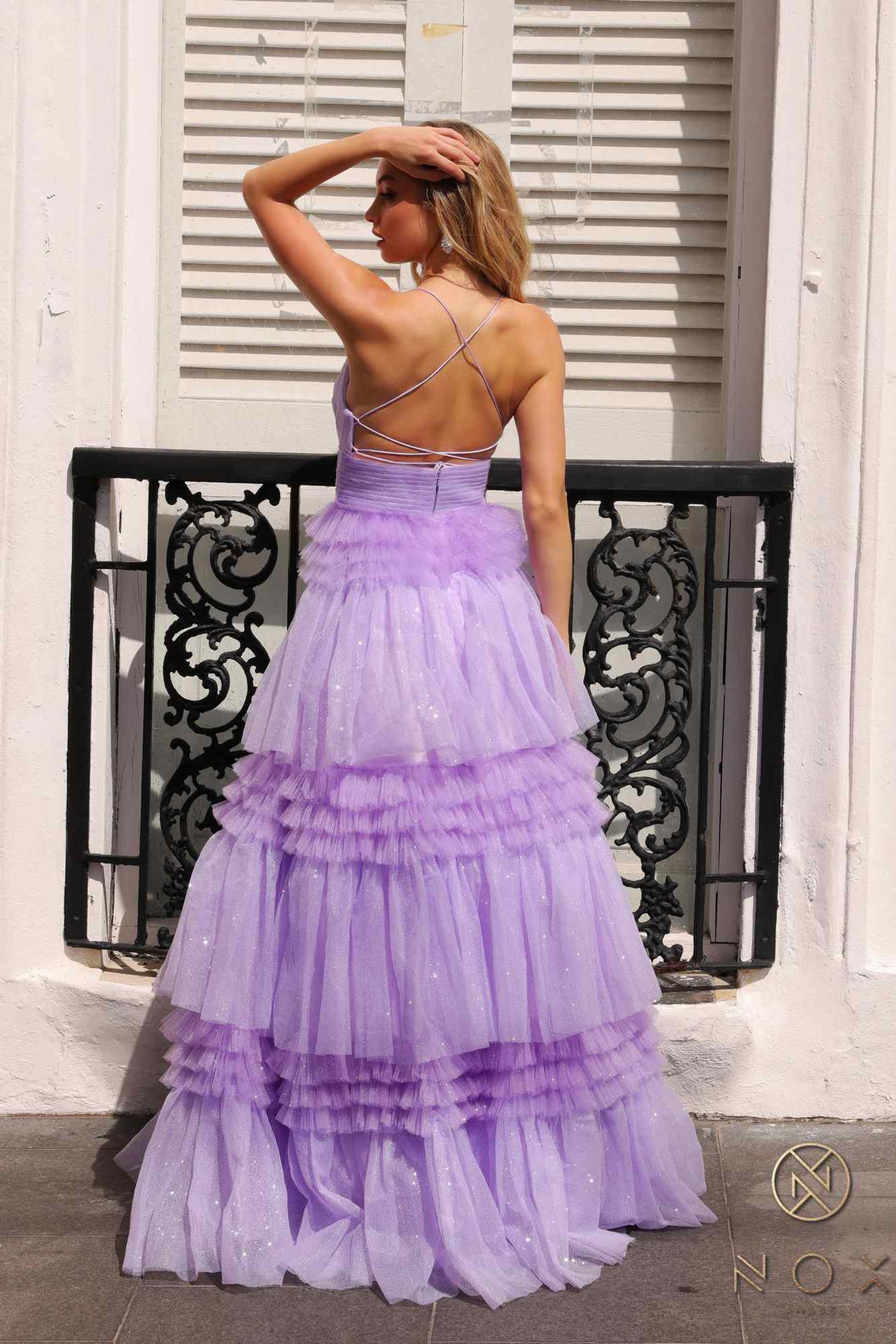 Lilac glitter tiered A-line gown with backless spaghetti straps and layered ruffles