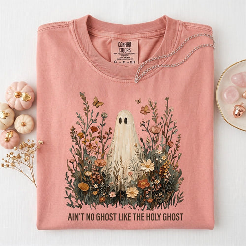 Light pink crewneck graphic tee with floral scene and large ghost illustration text