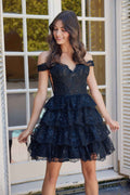 Black off-shoulder tiered A-line mini dress with lace texture and ruffled skirt