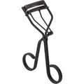 Surratt Beauty Relevée lash curler in black, with curved pads