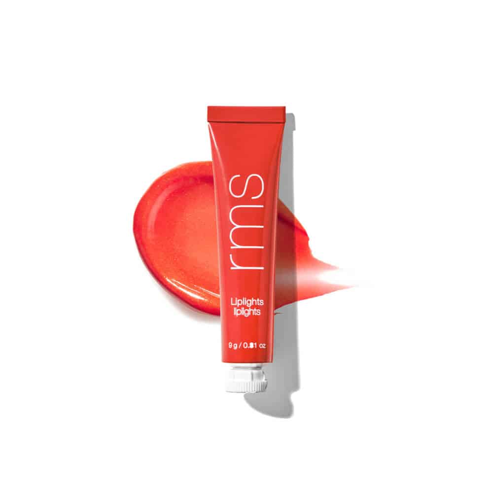 Bright orange cream lip gloss tube with glossy swatch