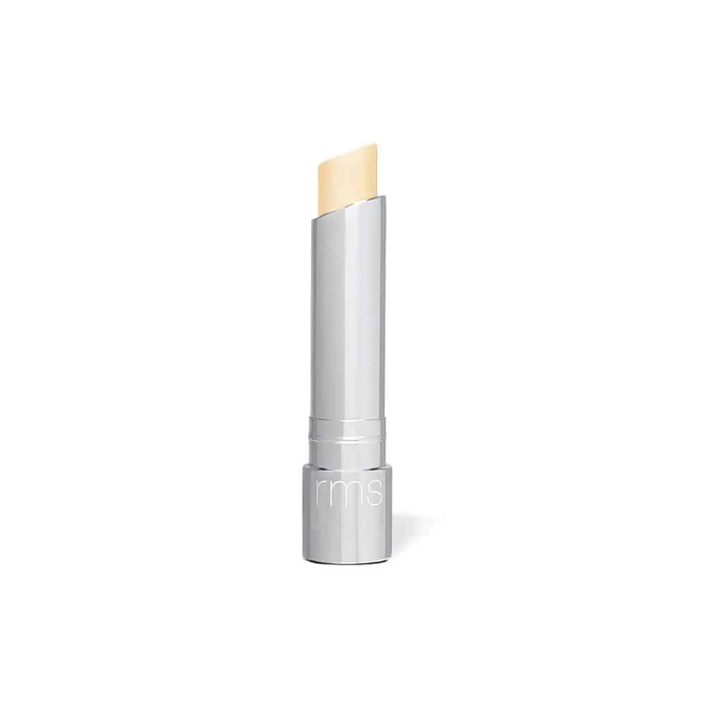 RMS tinted daily lip balm tube with beige balm tip in silver case