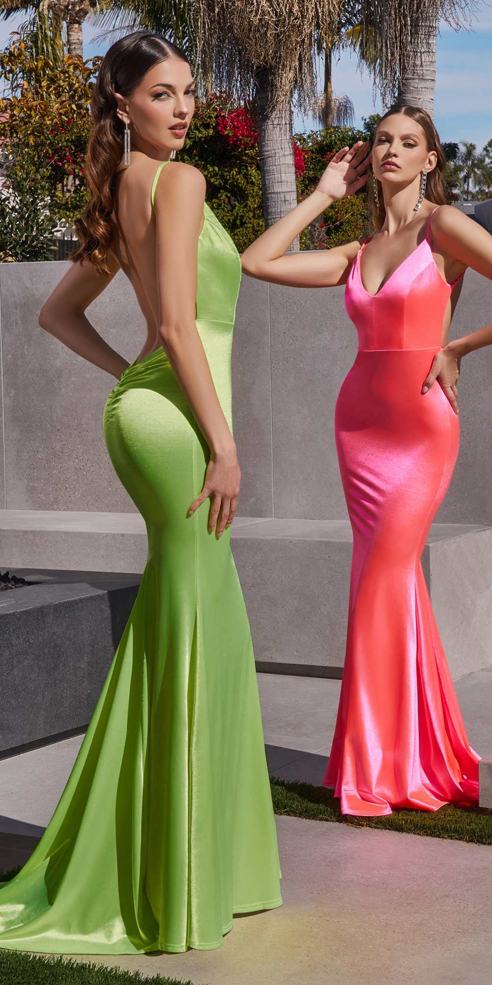 Two long fitted gowns: neon green and neon fuchsia, mermaid hems