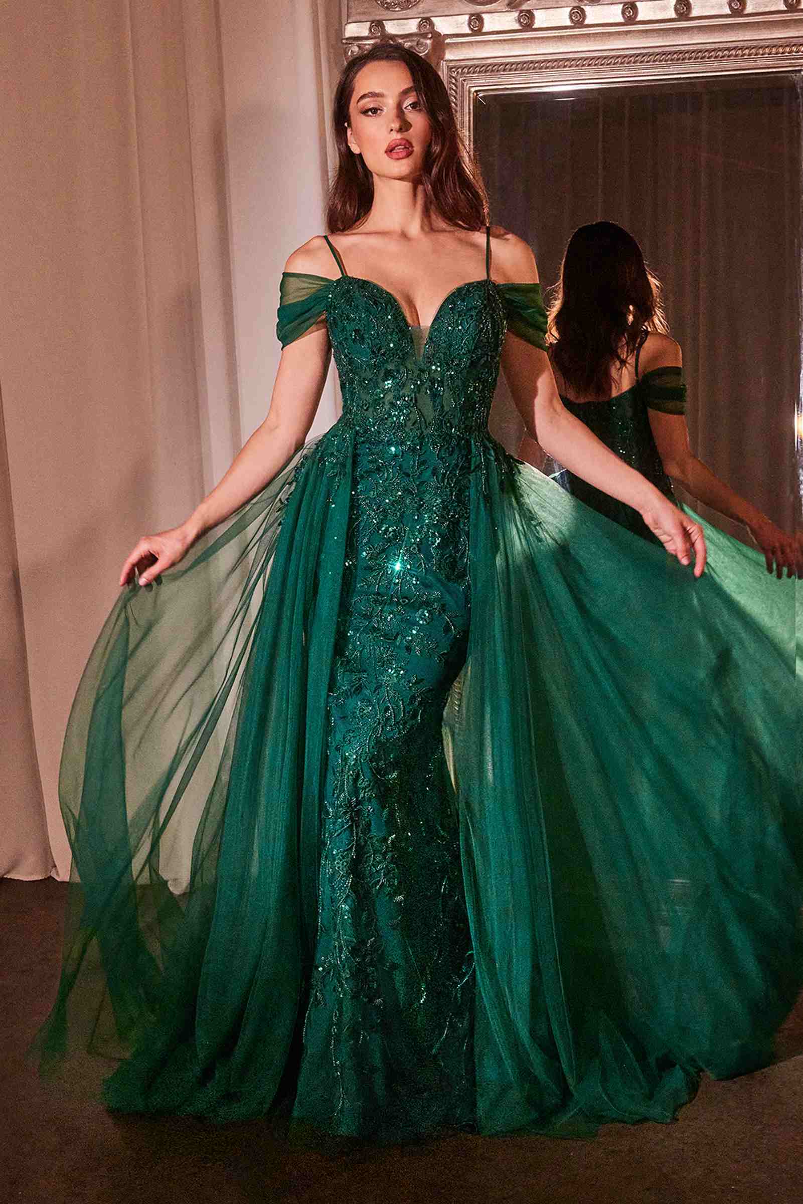 Emerald green off-shoulder fitted lace gown with full skirt and sparkling embellishment