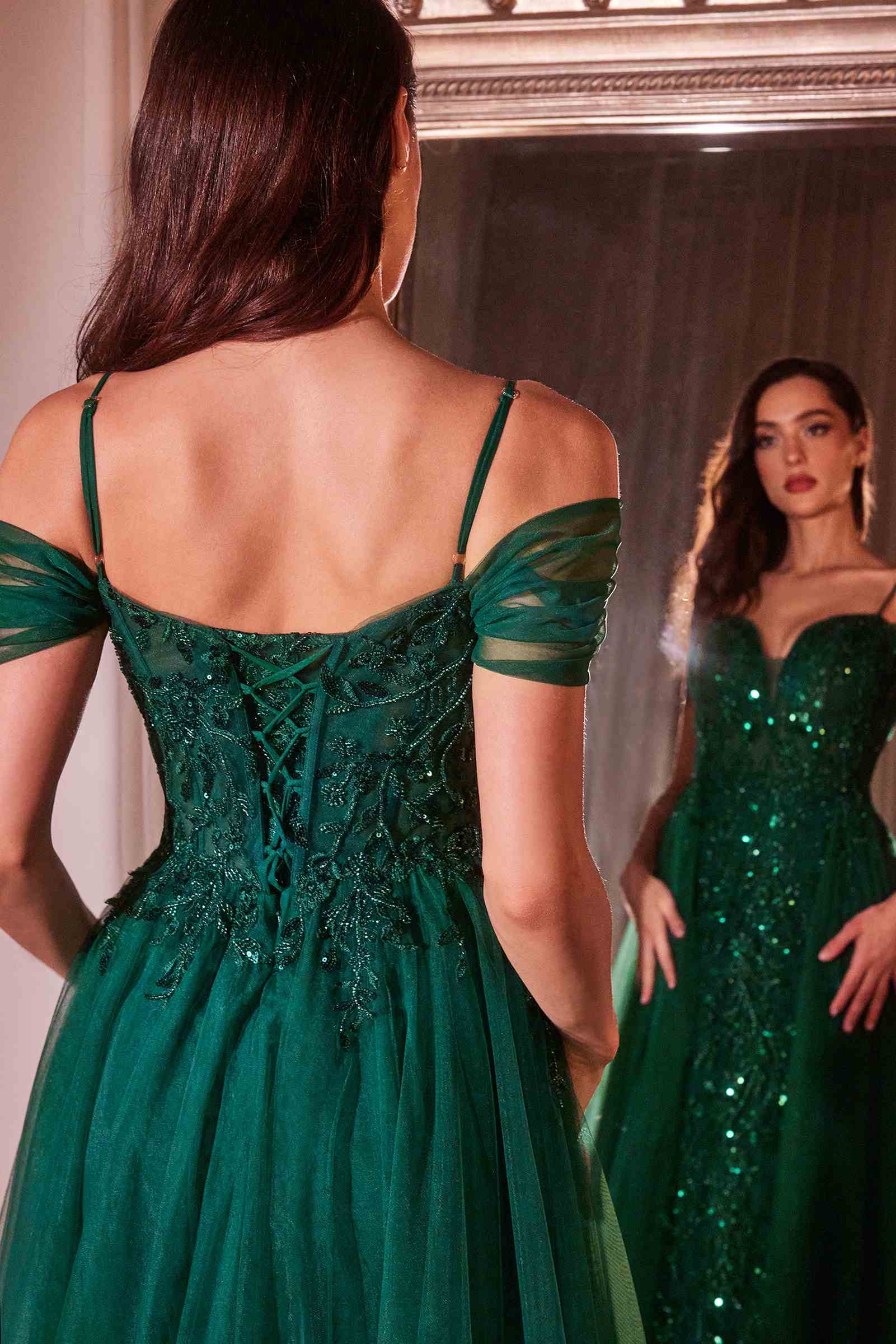 Emerald green off-shoulder gown with lace-up back and fitted bodice, long skirt