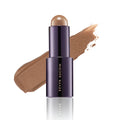 Kevyn Aucoin The Contrast Stick with light bronze makeup swatch and purple base