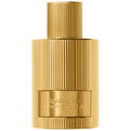 Gold ribbed perfume bottle with gold cap and Tom Ford Costa Azzurra label