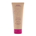 Aveda Cherry Almond body scrub tube, beige with magenta twist cap.