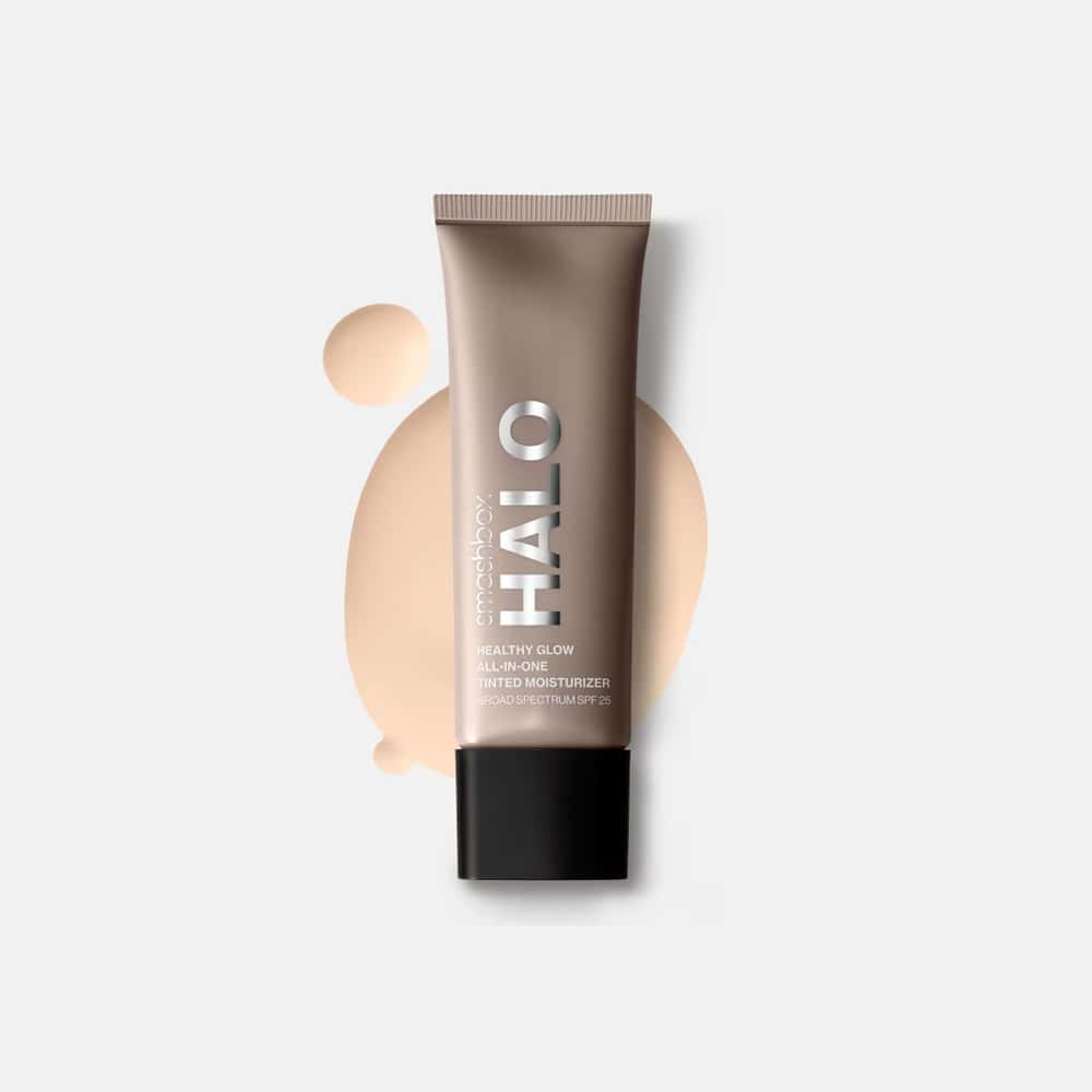 Tinted moisturizer tube with pale beige swatch and black base