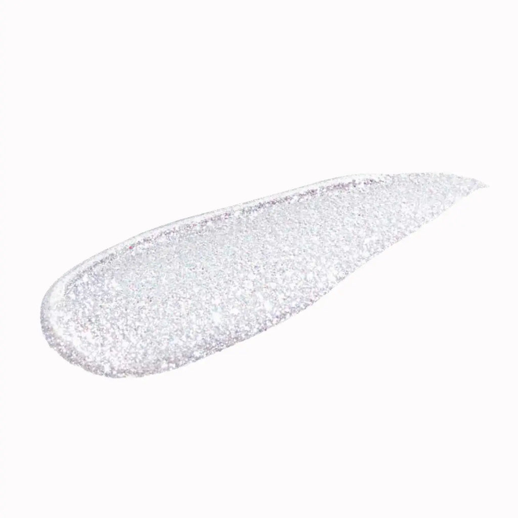 Silver glitter liquid eye shadow swatch, smooth teardrop streak.